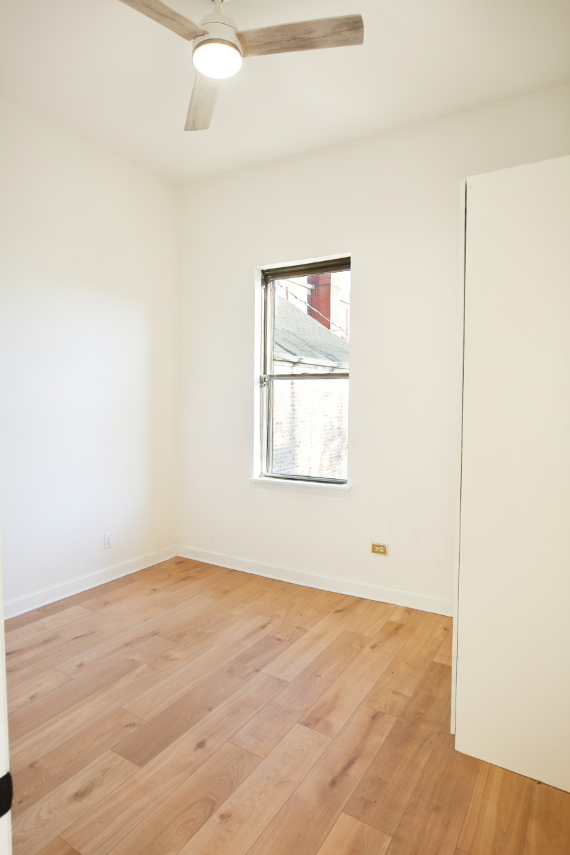 1077 W Polk #2 — back bedroom with neighborhood view
