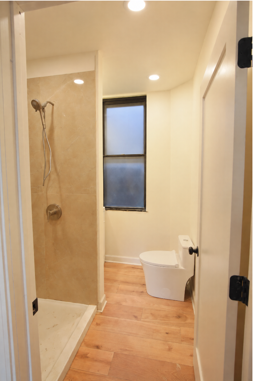 1077 W Polk #2 — bathroom with walk-in shower