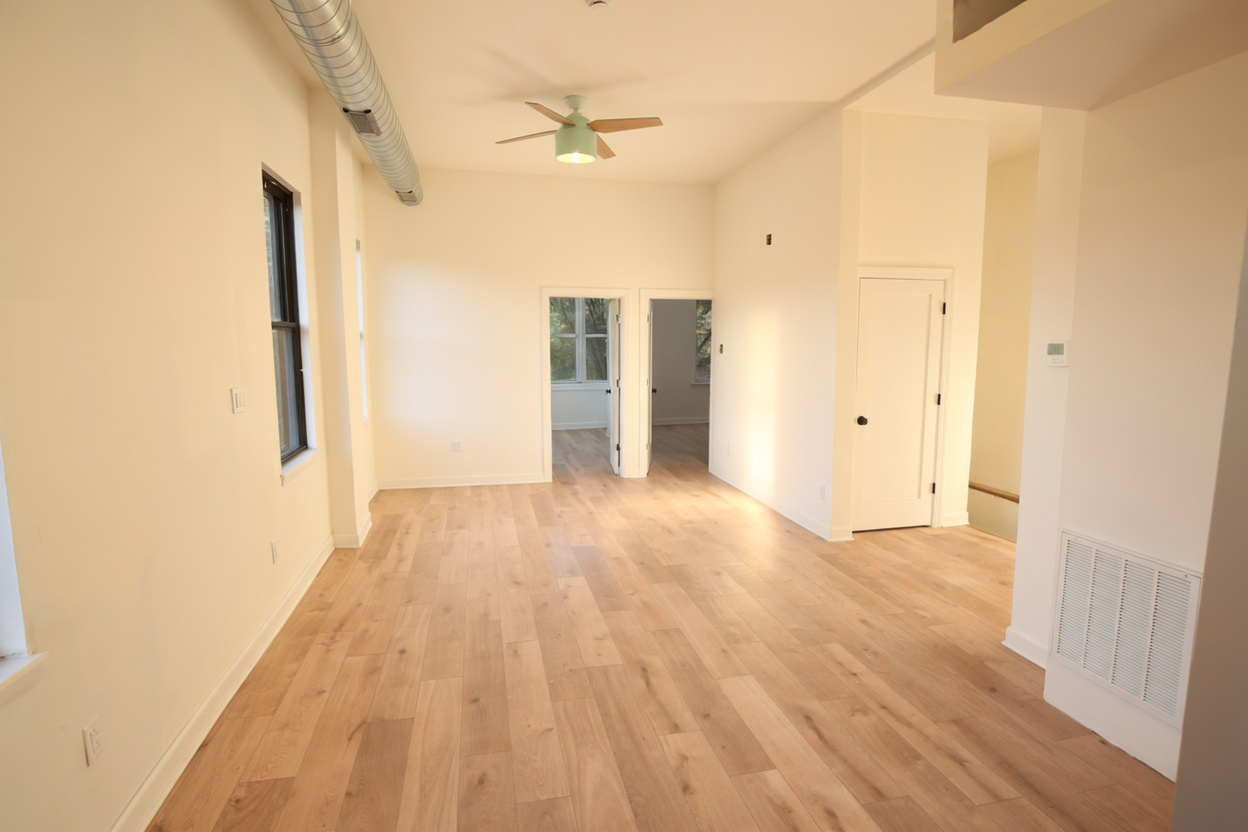 1077 W Polk #2 — living room, doors open to bedrooms