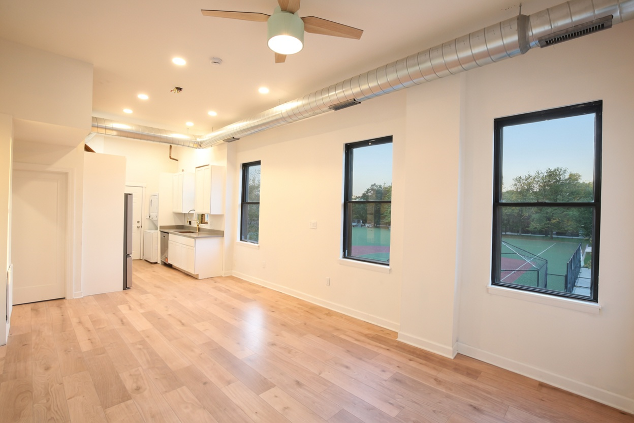 1077 W Polk #2 — living room with park views